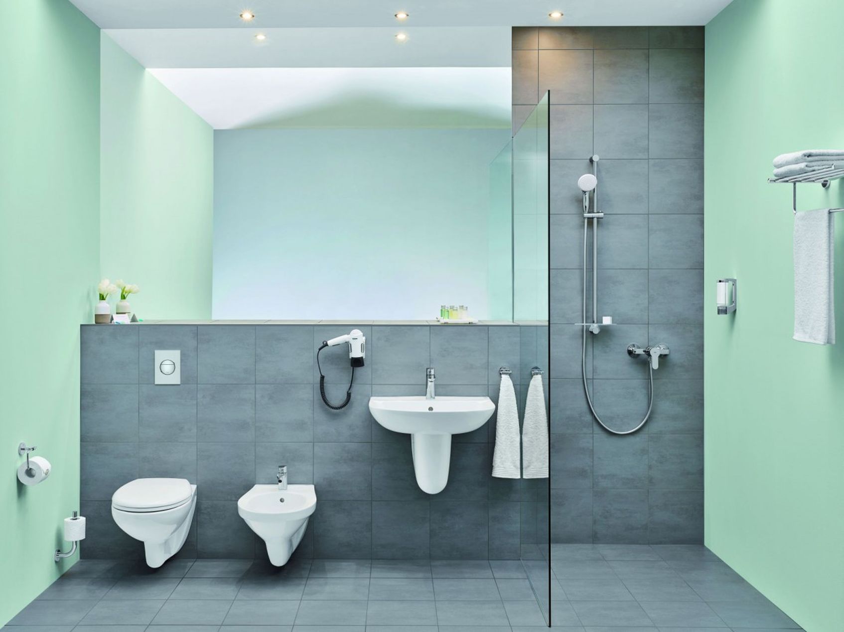 Ceramika Łazienkowa Umywalka Ścienna, Podwieszana z Otworem pod Baterię i Bidet Wiszący a także Muszla Klozetowa WC Wisząca Bezkołnierzowa oraz Armatura do Łazienki od Grohe - lazienkarium.pl Grohe Bau Ceramic